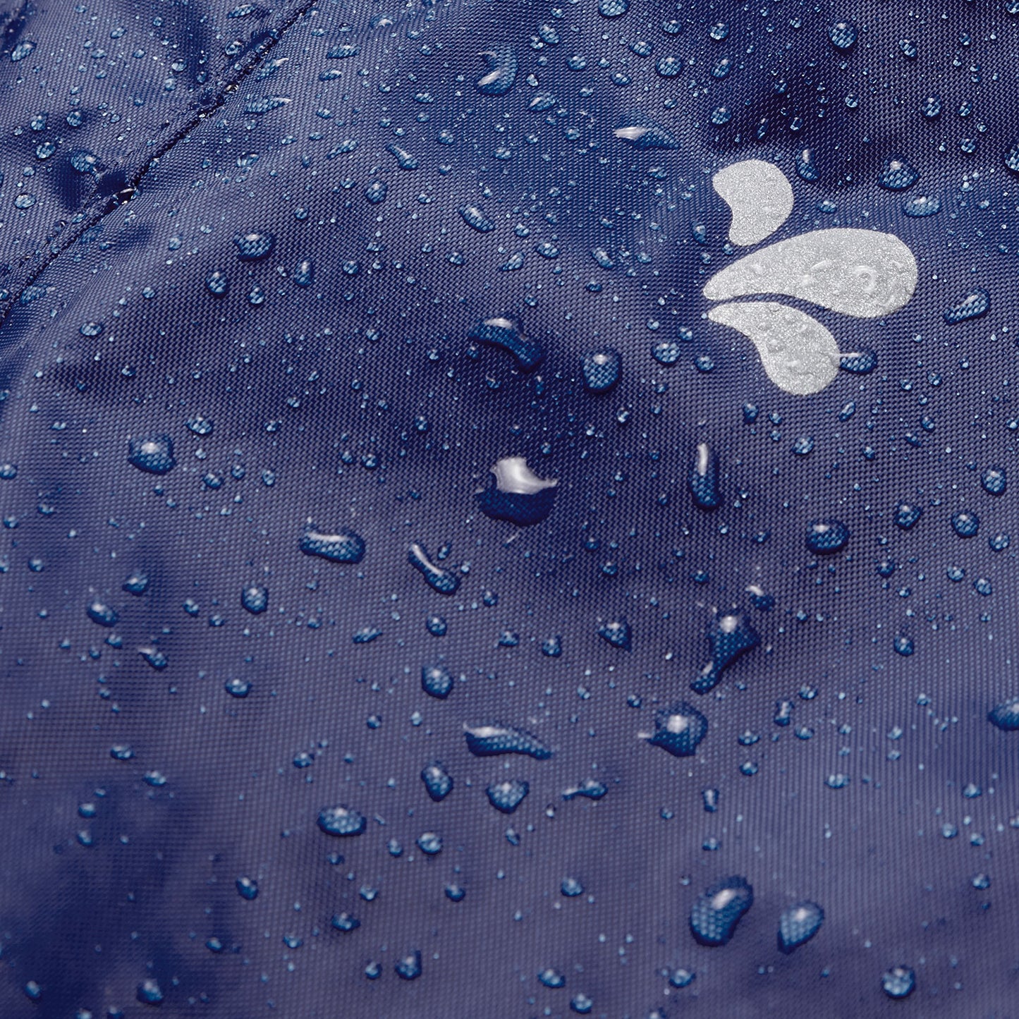 Close-up of navy Originals Waterproof Dungarees fabric, covered in water droplets and featuring the brand logo.