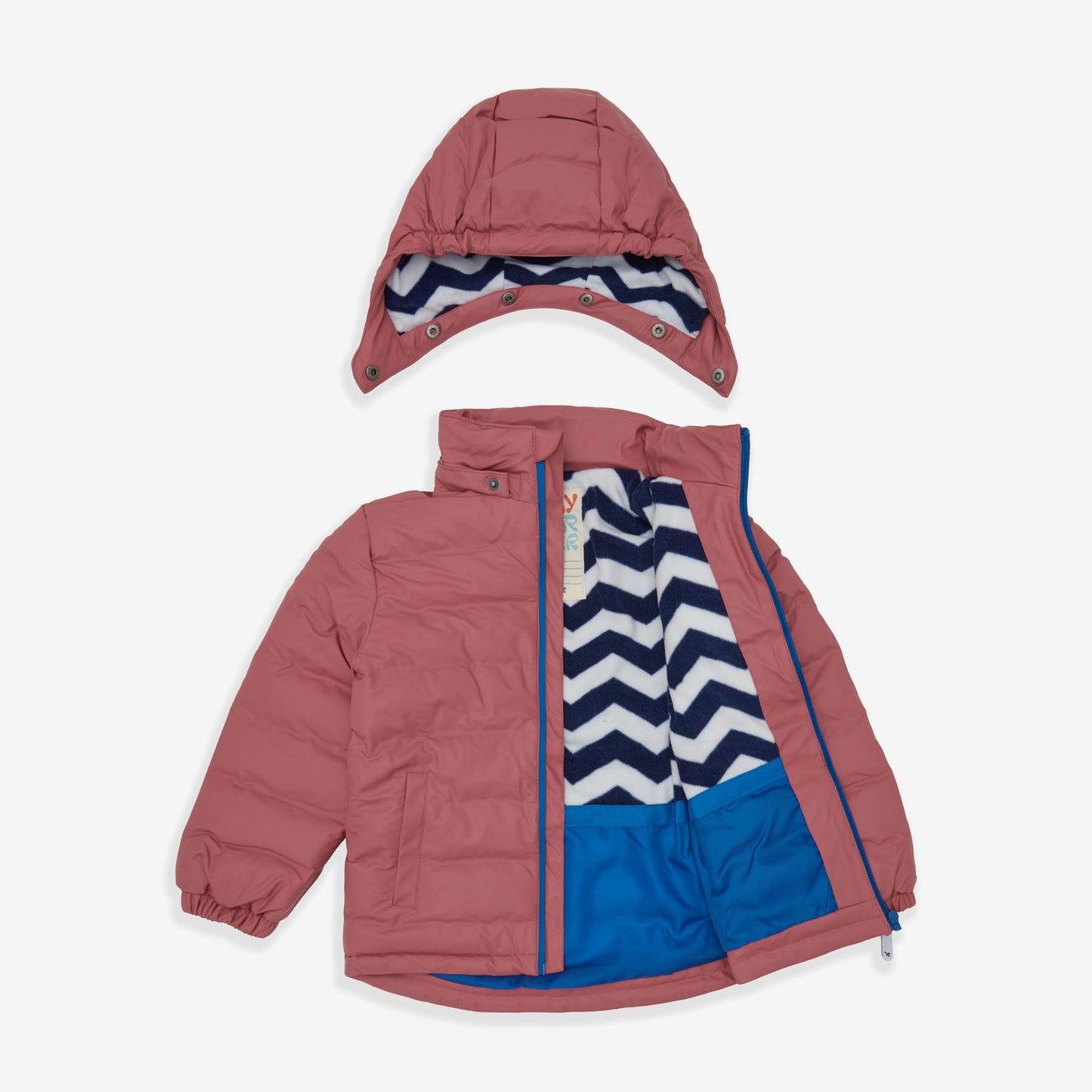 Waterproof Puffer Jacket Pink lying on a white surface with a hood detached above the jacket. The jacket is open, revealing a zig-zag patterned inner lining.