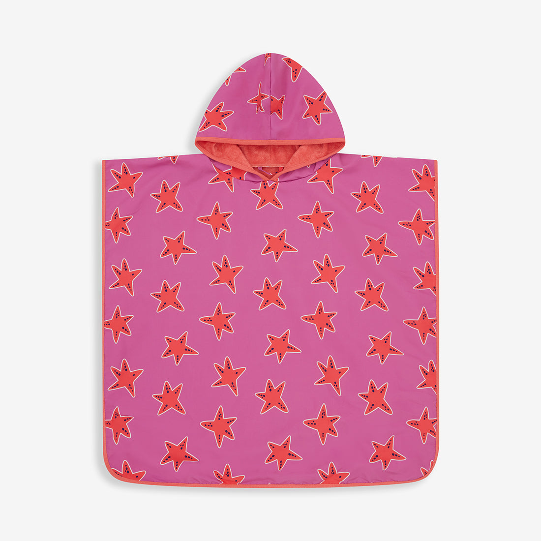 Beach Towel Poncho Pink Starfish. A pink hooded beach towel poncho with a pattern of red starfish covering it, laid out on a white background.