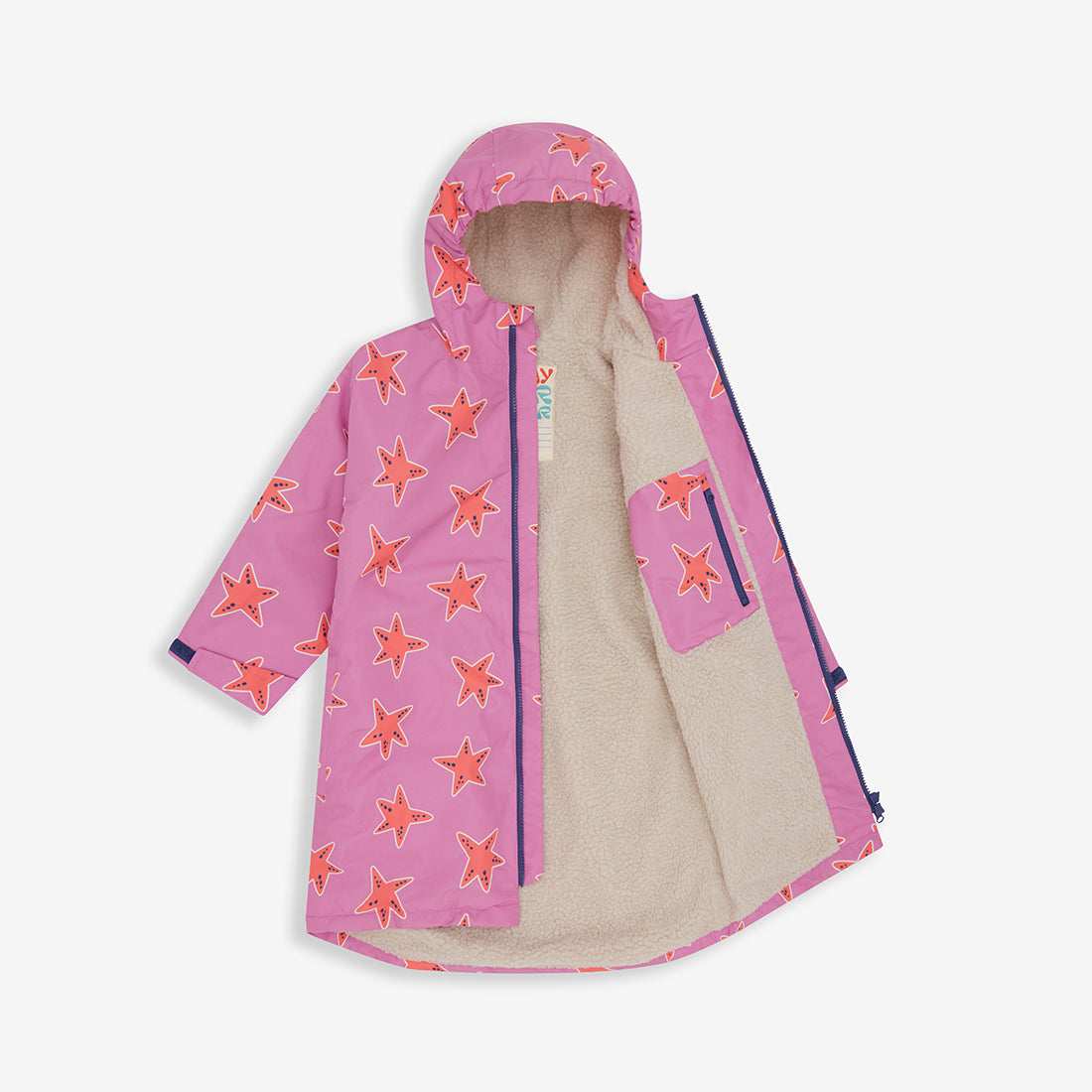 A pink Waterproof Changing Robe Pink Starfish with an all-over starfish pattern and a soft cream fleece lining.