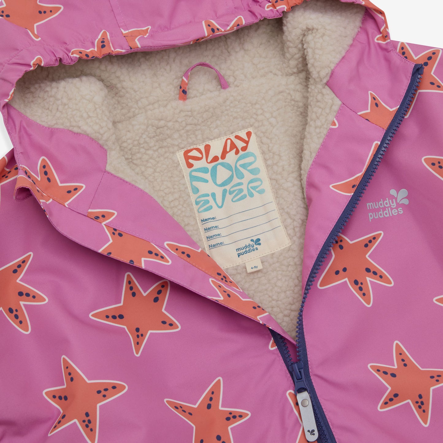 Close-up of the pink starfish Waterproof Changing Robe, showing its sherpa fleece lining, zip, hood and 'play forever' name label.