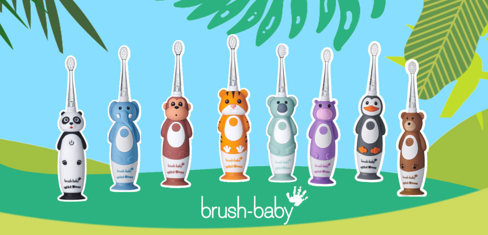 Colorful animal-themed children's electric toothbrushes arranged in a row on cartoon jungle background