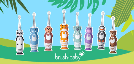 Colorful animal-themed children's electric toothbrushes arranged in a row on cartoon jungle background