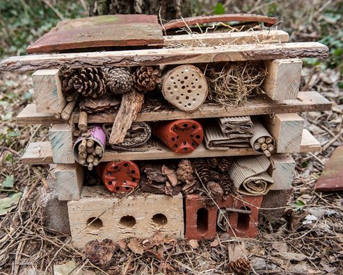 close up of a homemade woodland bug hotel