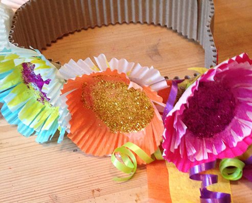 children's handmade flower crown with paper flowers and corrugated card