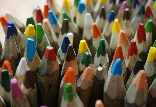 close up of variety of coloured pencil tips