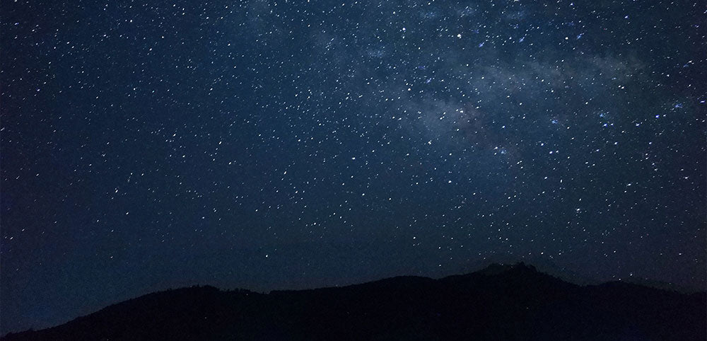 dark sky with stars and clouds