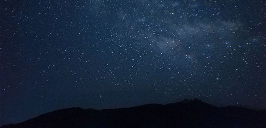 dark sky with stars and clouds