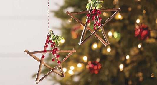 close up of handmade twig star christmas tree decorations