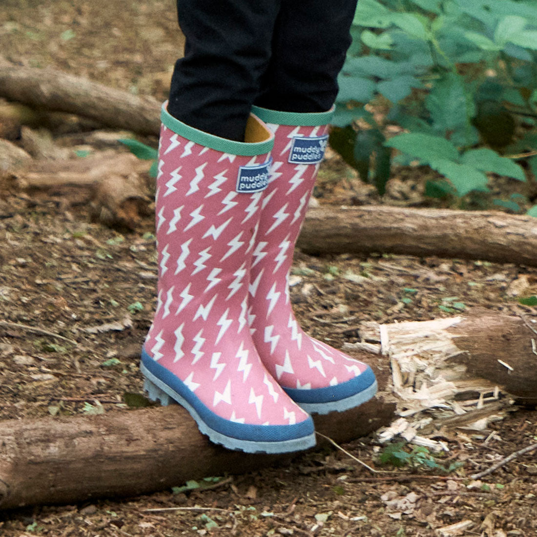 Girls in muddy clearance wellies