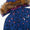 Waterproof Parka Blue Leopard by Muddy Puddles: Children's deep blue winter coat with black and pink splotches, faux-fur hood, and a zip pocket with logo.
