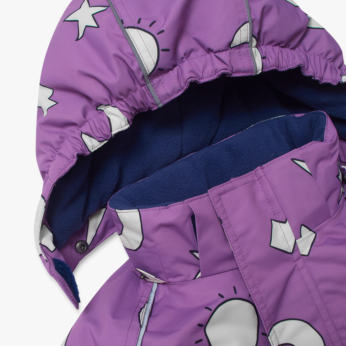 Blizzard Kids Ski Jacket Lilac Weather features a durable, waterproof shell with a white star/sun-print, and a cozy navy fleece-lined hood, perfect for adventurous outdoor play.