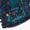 Blizzard Kids Ski Jacket Navy Weather features a durable, waterproof design with colorful shapes, teal quilted lining, and wind-flaps to protect against harsh conditions.