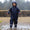 a young girl dancing in the rain wearing puddeflex kids waterproof puddle suit