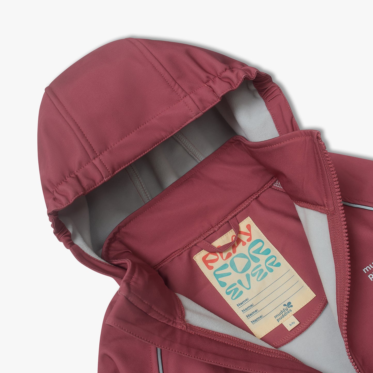 Children’s Waterproof Softshell Jacket Pink with a hood, open front zip, and reflective details, designed for comfort and protection, featuring a customizable name tag.