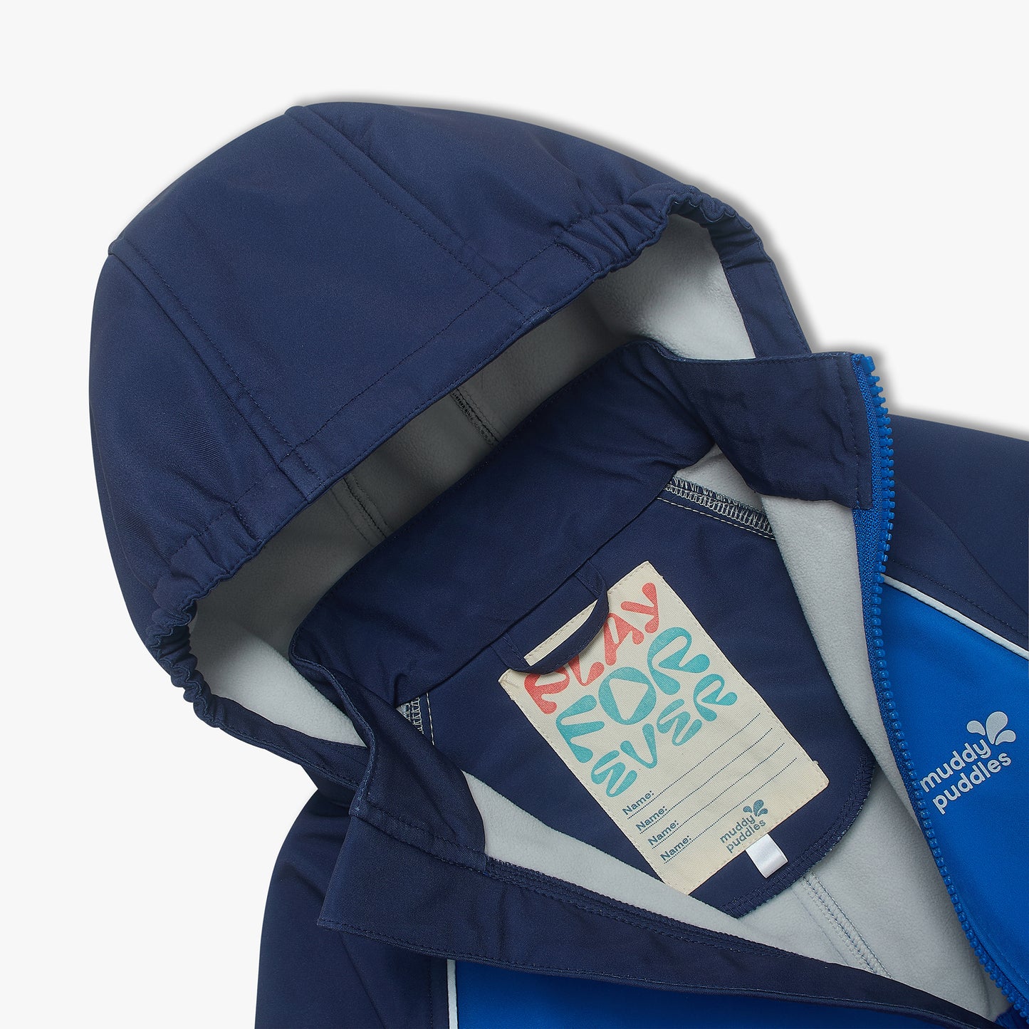 Inside view of the Waterproof Softshell Puddle Suit Blue, showcasing its navy fleece-lined hood and PLAY FOREVER name-tag, highlighting durability and weather protection.