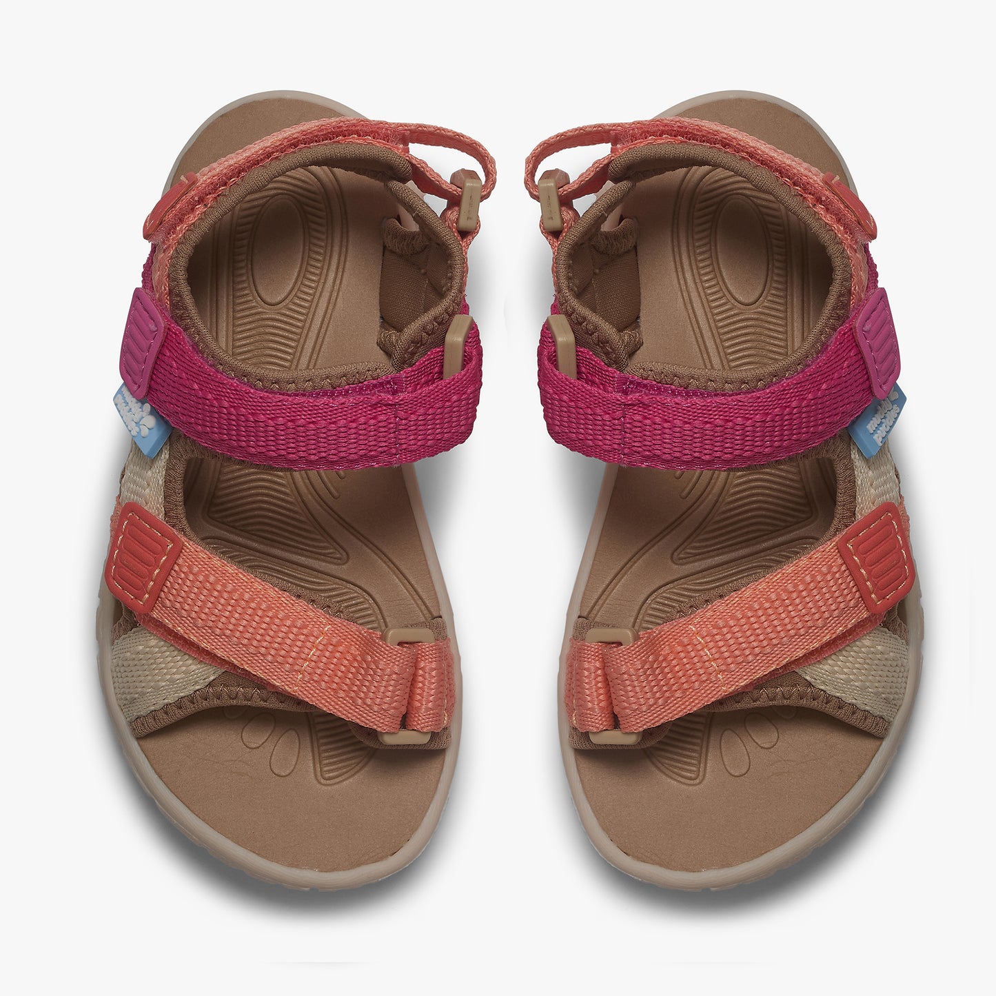 Trekker Kids Sandals Pink, featuring adjustable webbing straps and molded footbeds, designed for durable comfort and grip during outdoor adventures.