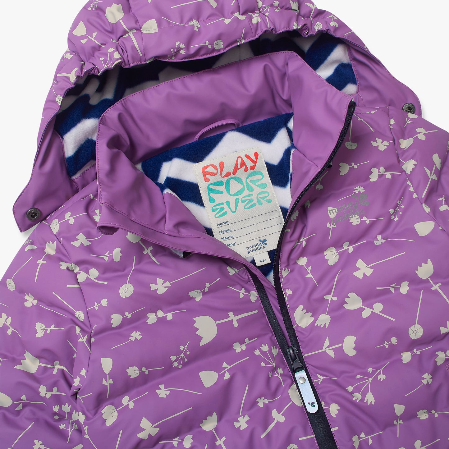 Waterproof Puffer Jacket Lilac Floral: A durable children's purple hooded jacket with cream floral design, featuring a blue-and-white fleece lining and PLAY FOREVER label by Muddy Puddles.